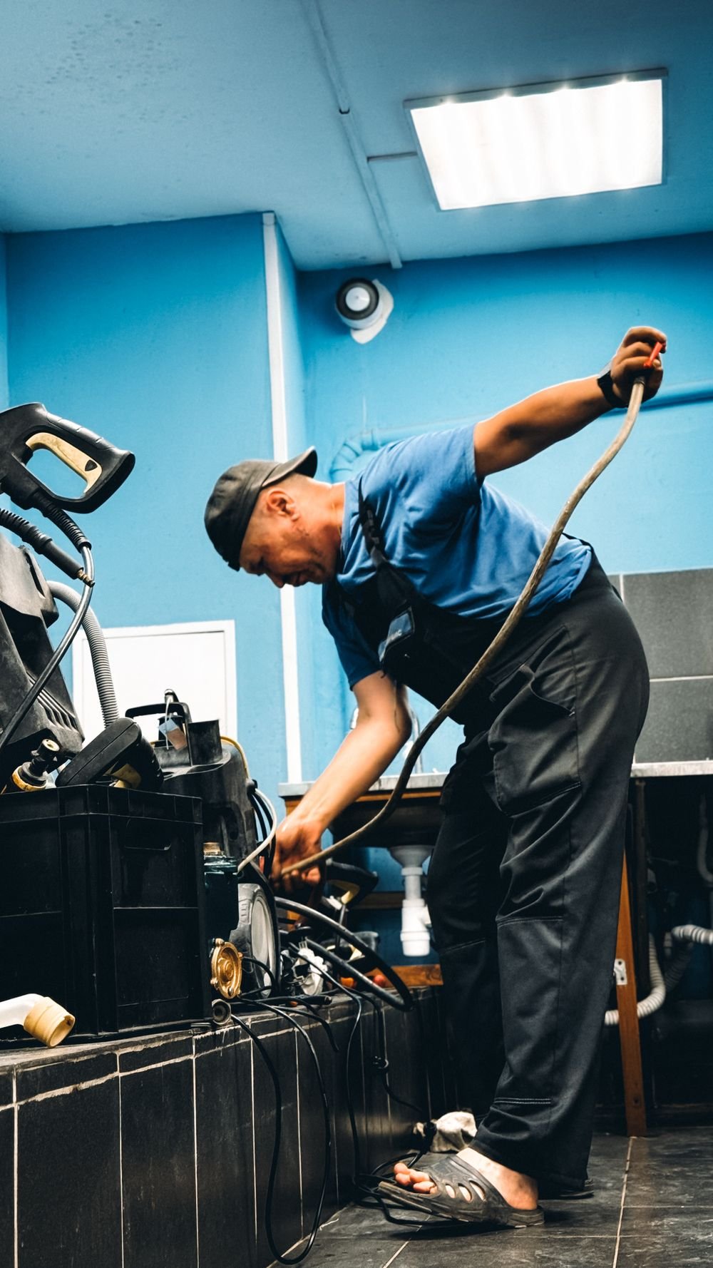 Technician repairing equipment