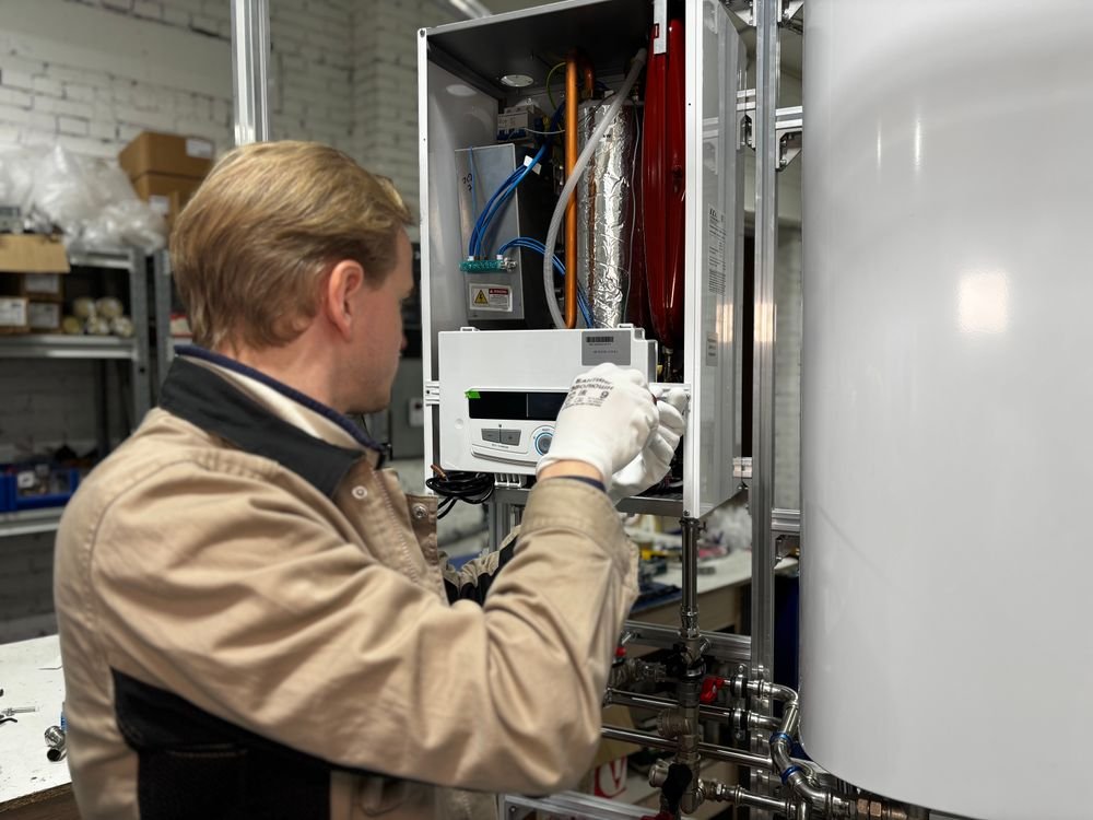 Technician working on a water heater